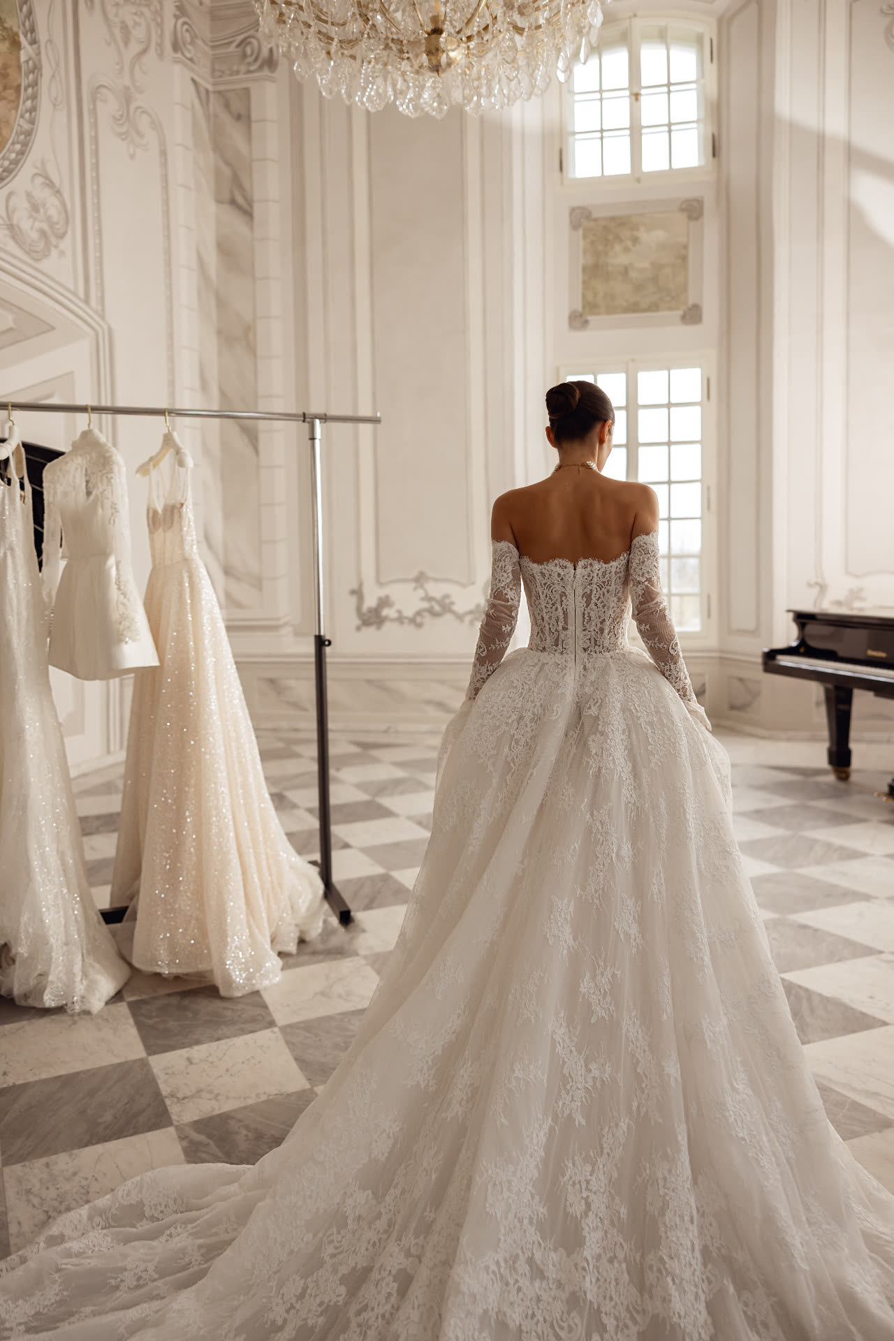 Master couturier taking custom measurements